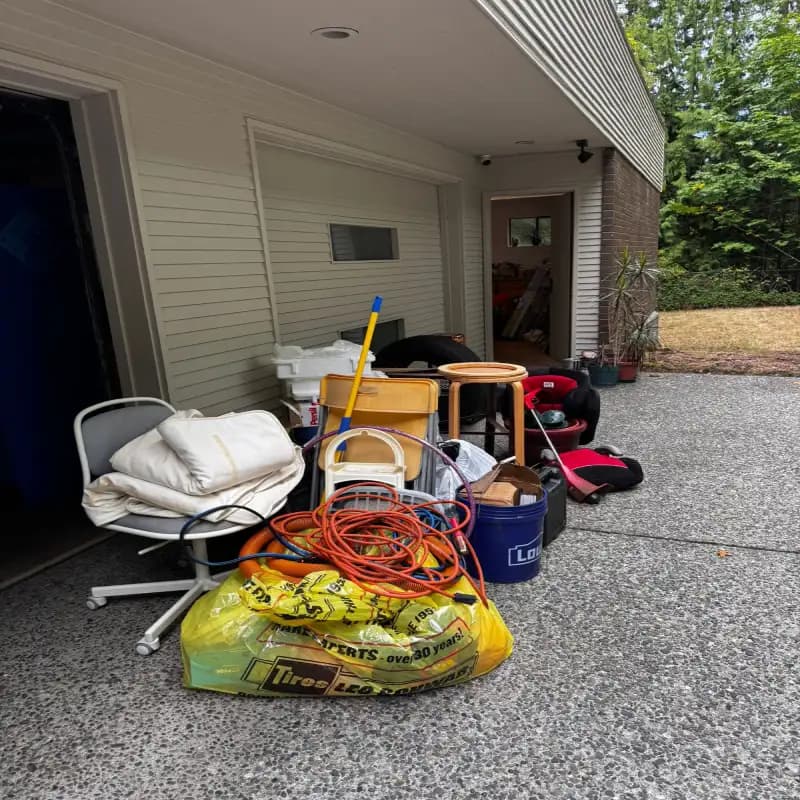 A cluttered door way in Seattle before junk removal